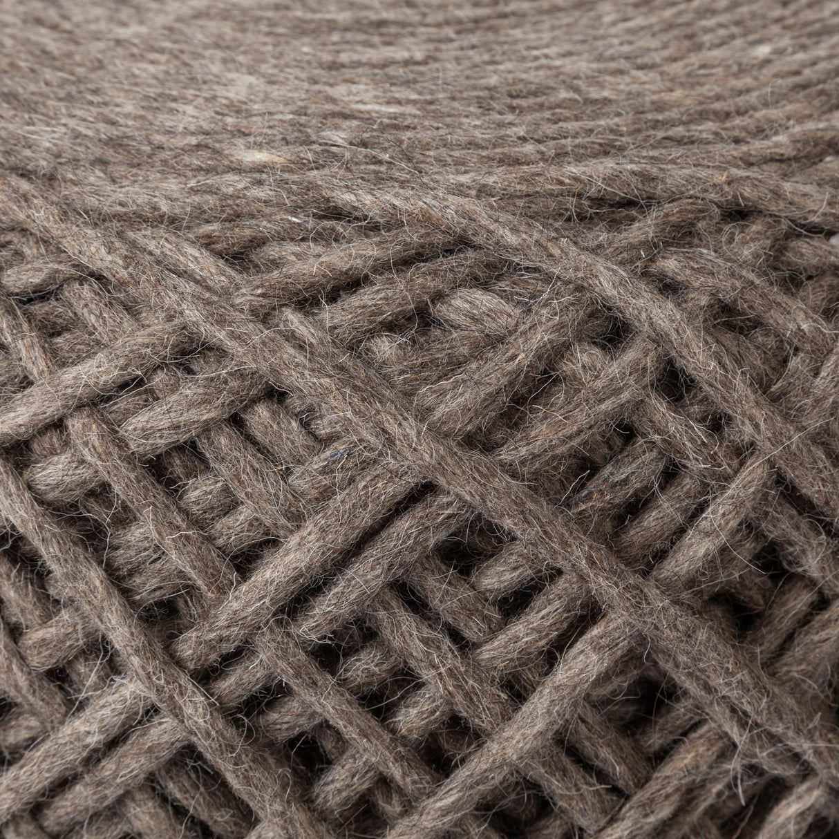 Allium Dark Brown Handwoven Wool Cylindrical Pouf from Mercana - Luna Furniture