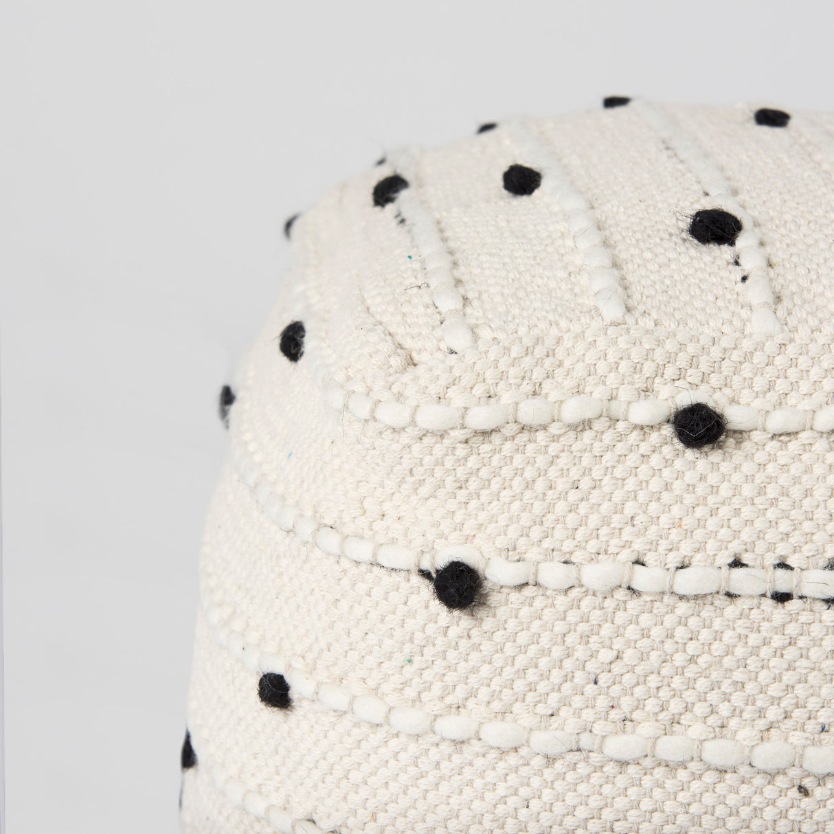 Amaira 16.0L x 16.0W x 16.0H Cream/Black/White patterned Wool and Cotton Pouf from Mercana - Luna Furniture