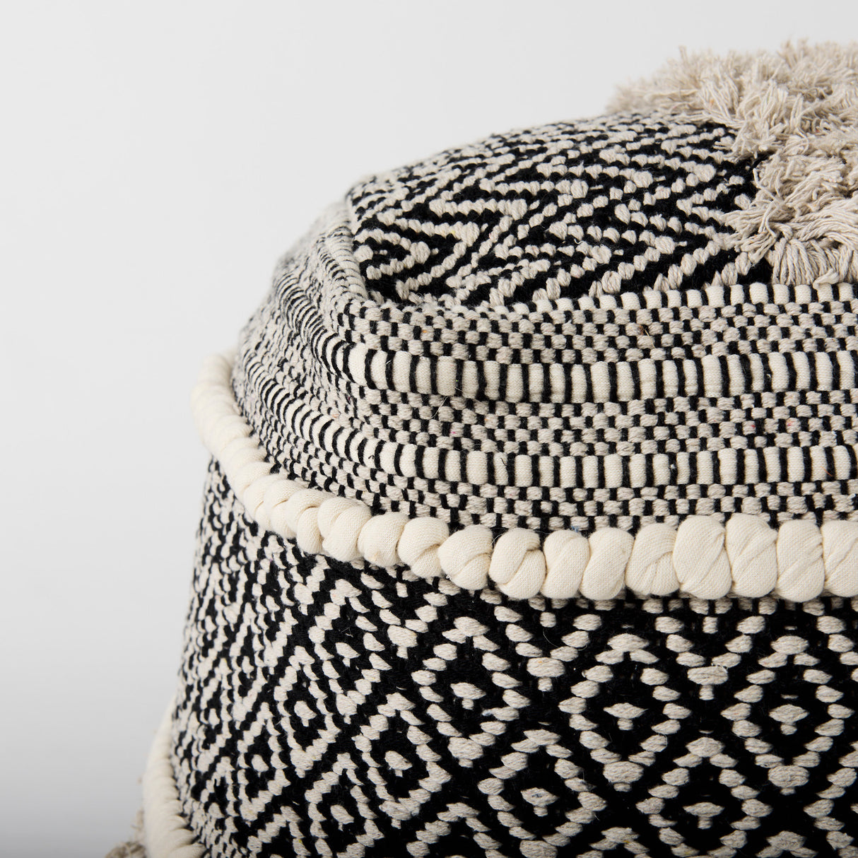Darika 16.0L x 16.0W x 16.0H Black/White/Gray Cotton Pouf from Mercana - Luna Furniture