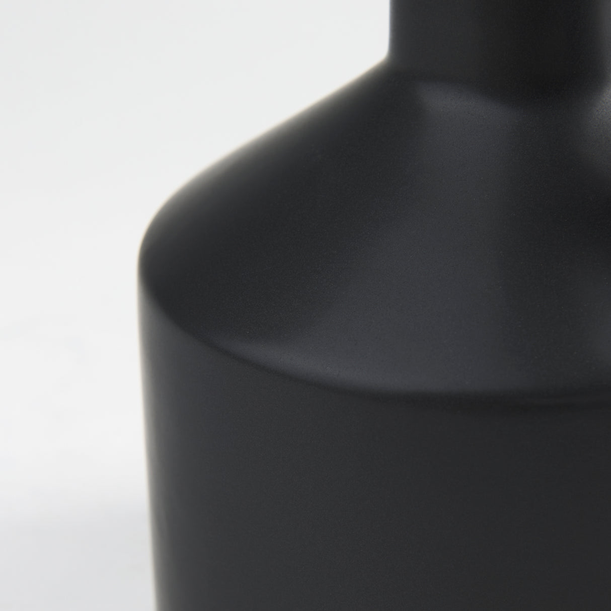 Burton 10.8H Small Matte Black Ceramic Jug Vase from Mercana - Luna Furniture