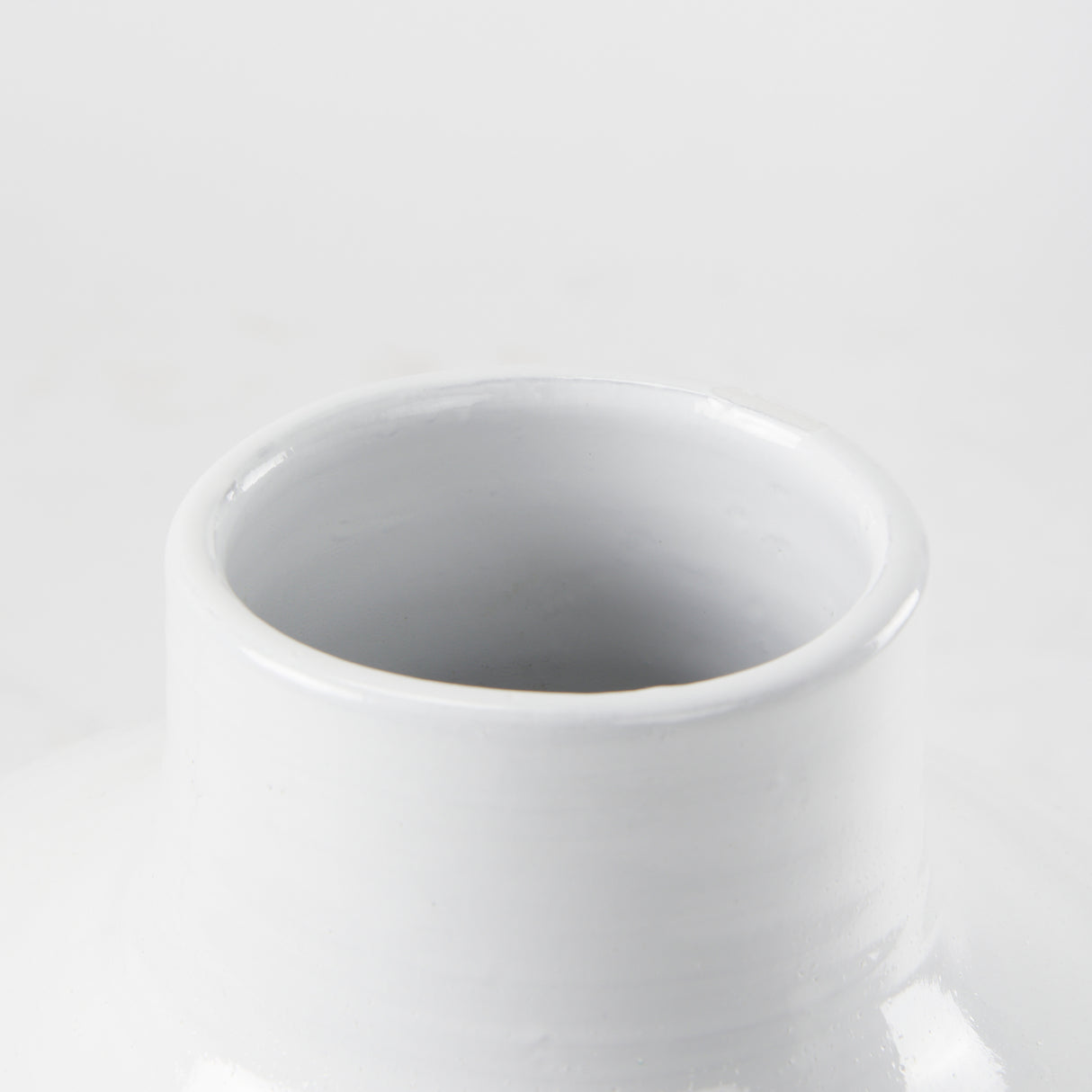 Amos 18.5L x 18.5W x 24.4H White and Dark Beige Color Blocked Ceramic Floor Vase from Mercana - Luna Furniture