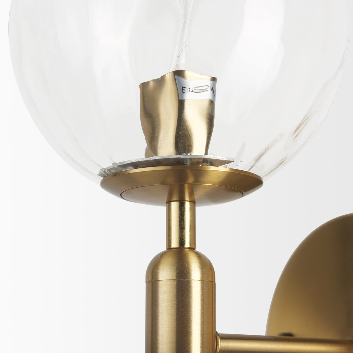 Britton Gold Metal w/ Clear Glass Globe 1-Light Wall Sconce from Mercana - Luna Furniture