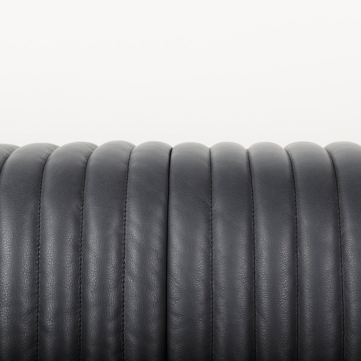 Ricciardo Black Leather Wrapped Three Seater Sofa 82.5L x 38.5W x 26.5H from Mercana - Luna Furniture