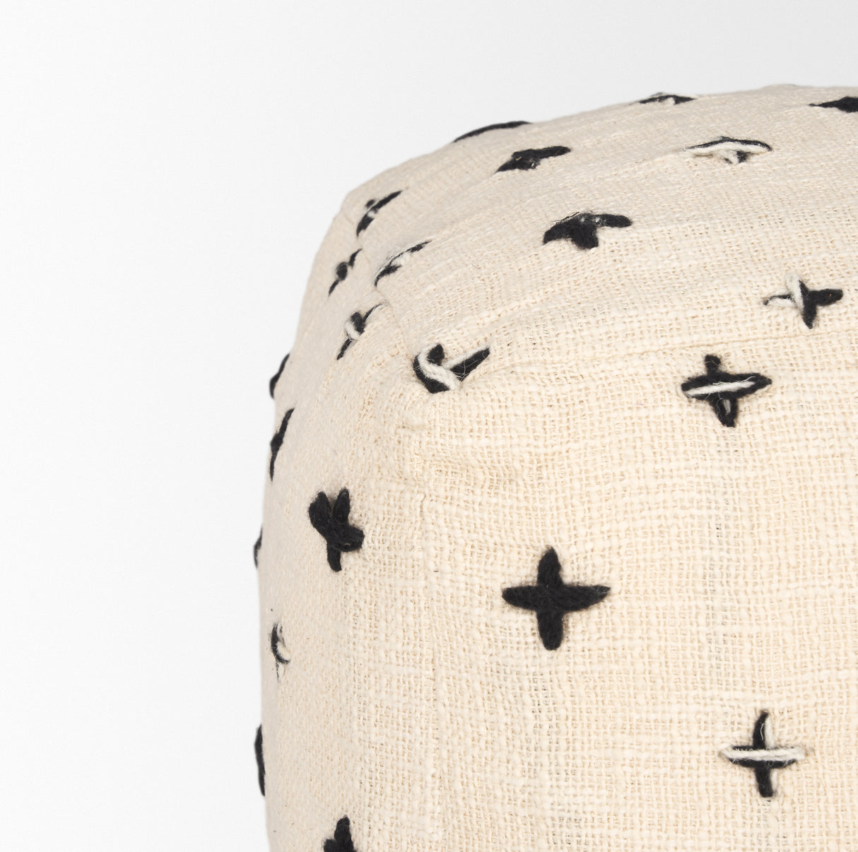 Saanvi Wool w/ Cream and Black Stitched Cross Patterned Pouf from Mercana - Luna Furniture