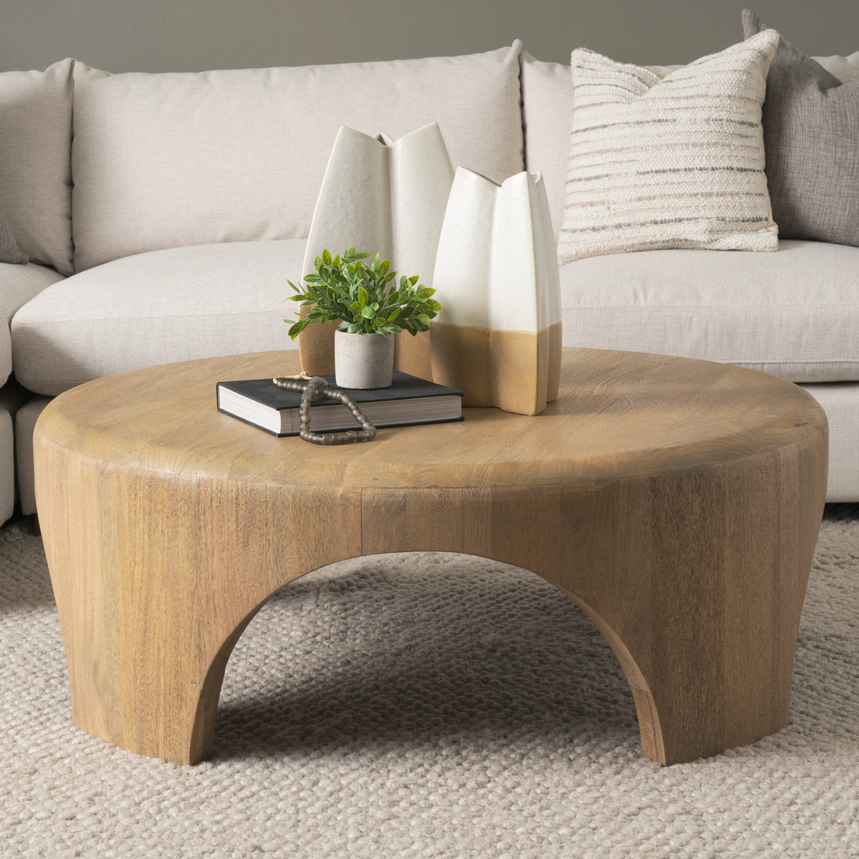 Shima Round Light Brown Wood W/Arched Legs Coffee Table from Mercana - Luna Furniture