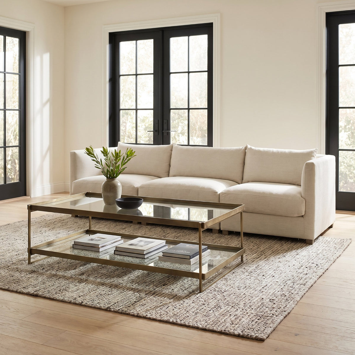 Trey 56.0L x 32.0W x 17.0H Gold Metal W/Glass Coffee table from Mercana - Luna Furniture