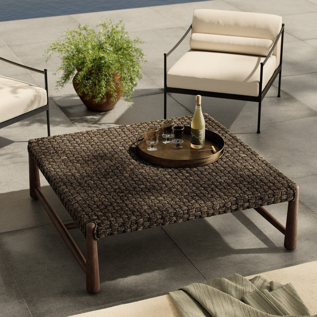 Savio Outdoor Coffee Table in Stained Saddle Brown from Four Hands - Luna Furniture