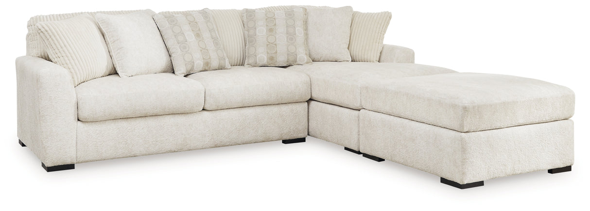 Chessington Cream 2-Piece Sectional and Ottoman from Ashley Furniture - Luna Furniture