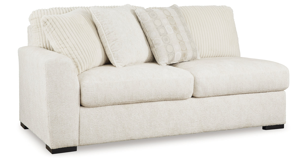 Chessington Cream 2-Piece Sectional and Ottoman from Ashley Furniture - Luna Furniture