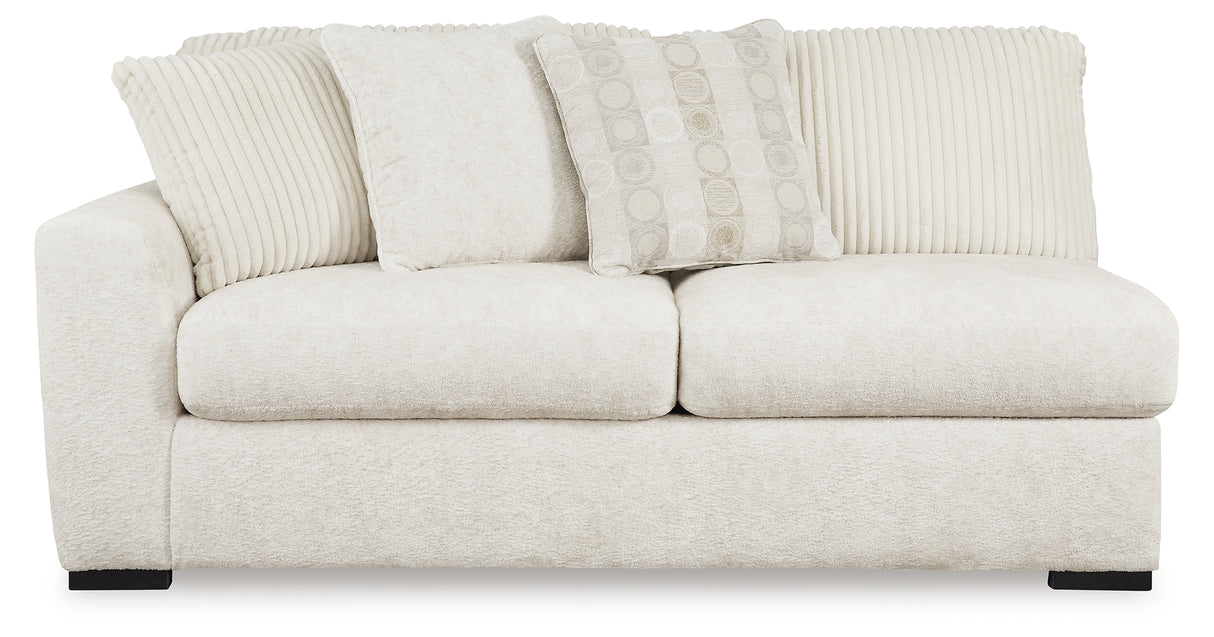 Chessington Cream 2-Piece Sectional and Ottoman from Ashley Furniture - Luna Furniture