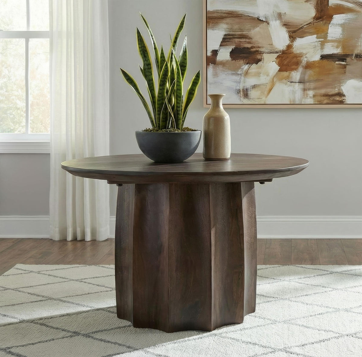 Cayenne Walnut cocktail coffee table, styled living-room view with plant and vase
