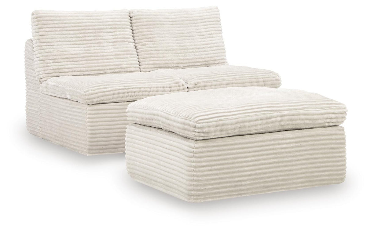 Fannin Ivory Armless Chair with Ottoman from Ashley - Luna Furniture