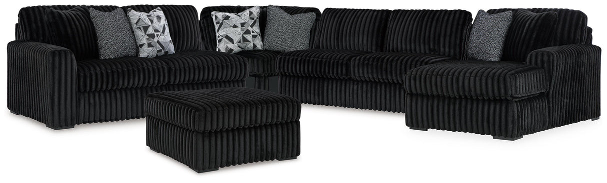 Midnight-Madness 4-Piece Sectional with Ottoman in Onyx from Ashley - Luna Furniture