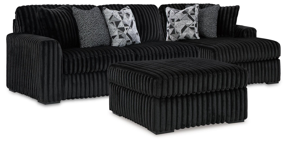 Midnight-Madness Onyx RAF Chase Sectional and Ottoman from Ashley Furniture - Luna Furniture