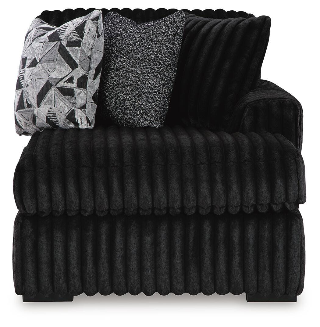 Midnight-Madness 4-Piece Sectional with Ottoman in Onyx from Ashley - Luna Furniture