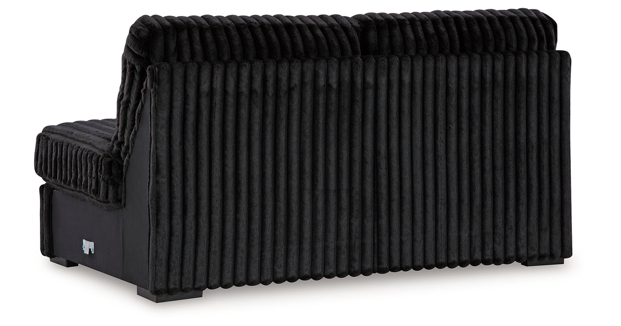 Midnight-Madness 4-Piece Sectional with Ottoman in Onyx from Ashley - Luna Furniture