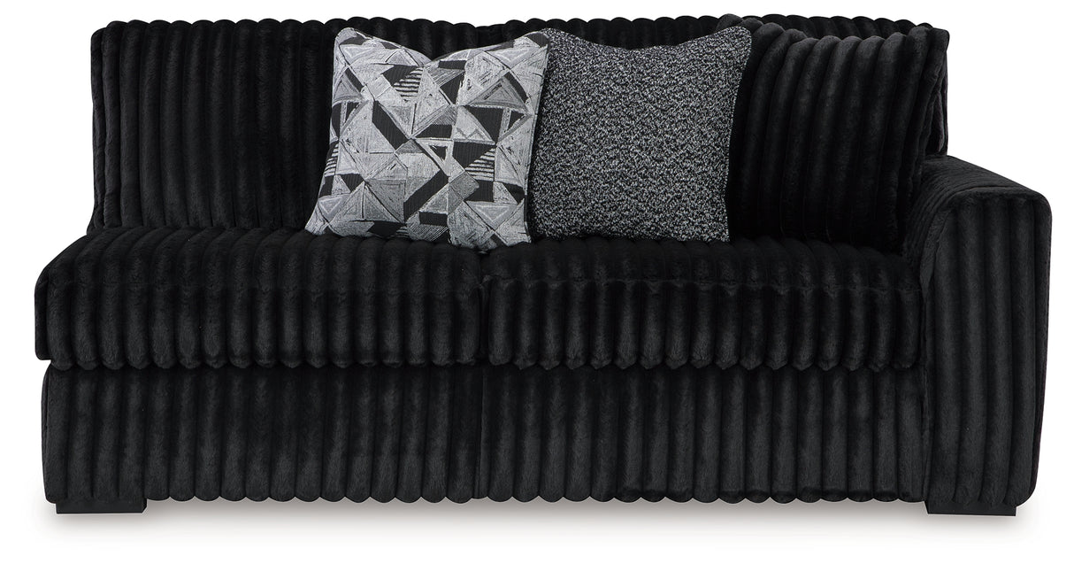 Midnight-Madness 4-Piece Sectional with Ottoman in Onyx from Ashley Furniture - Luna Furniture