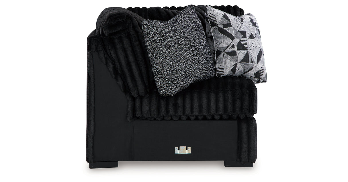 Midnight-Madness 4-Piece Sectional with Ottoman in Onyx from Ashley - Luna Furniture