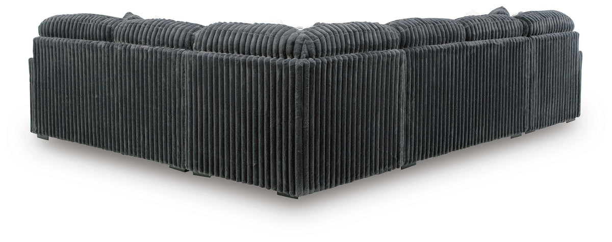 Midnight-Madness 4-Piece Sectional and Ottoman from Ashley - Luna Furniture