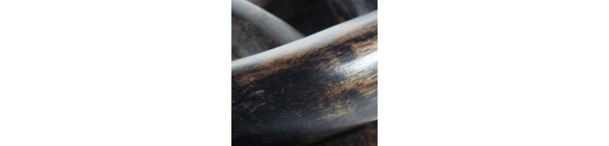 Mardelby Distressed Black Sculpture from Ashley Furniture - Luna Furniture