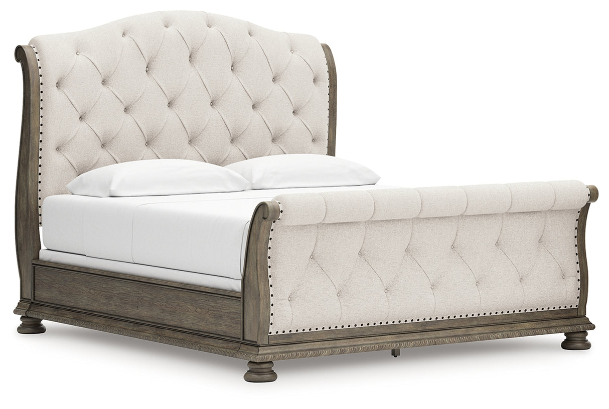 Ardenfield California King Upholstered Sleigh Bed with Mirrored Dresser, Chest and Nightstand in Light Brown from Ashley Furniture - Luna Furniture