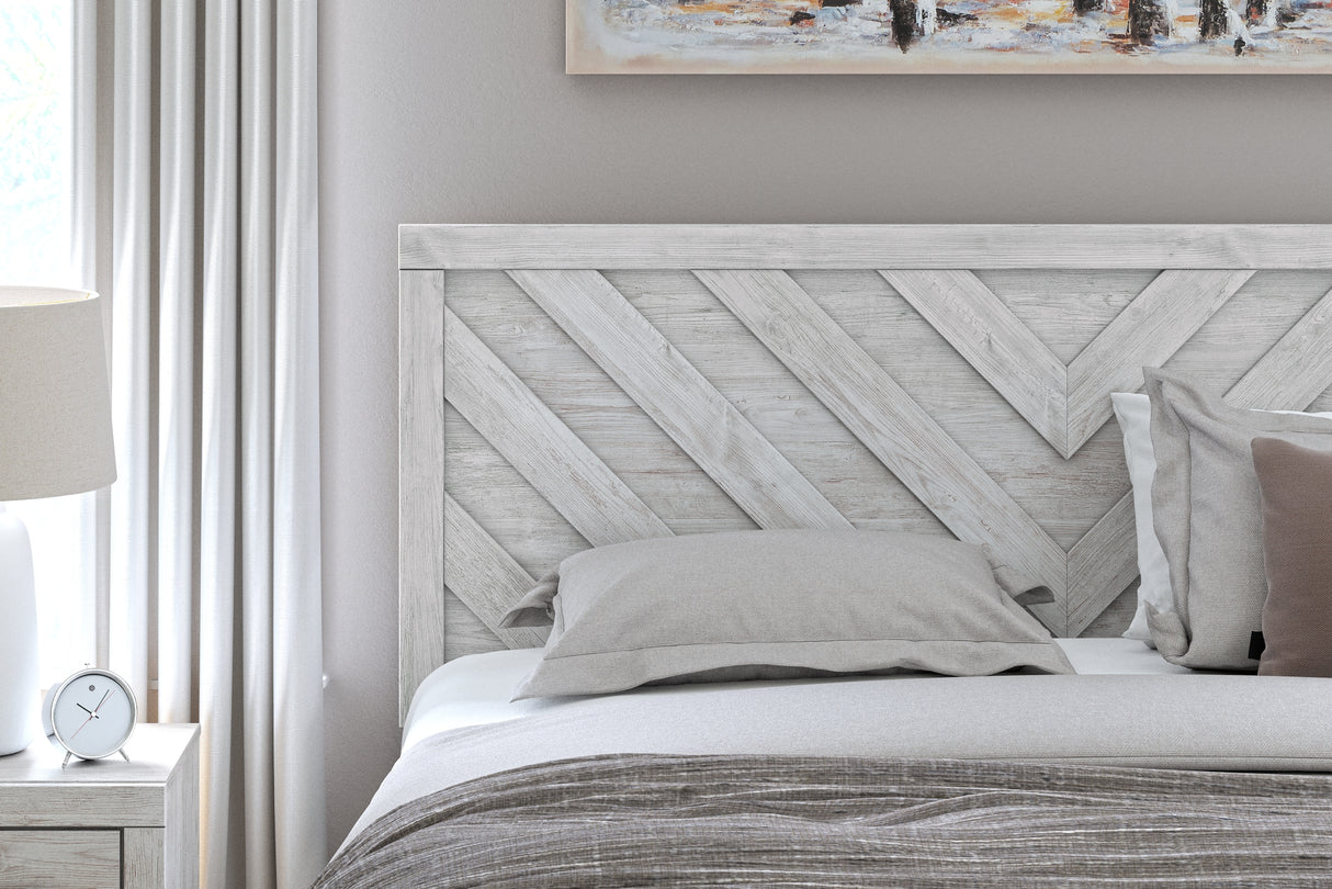 Cayboni King Panel Bed with Mirrored Dresser and Chest in Whitewash from Ashley Furniture - Luna Furniture
