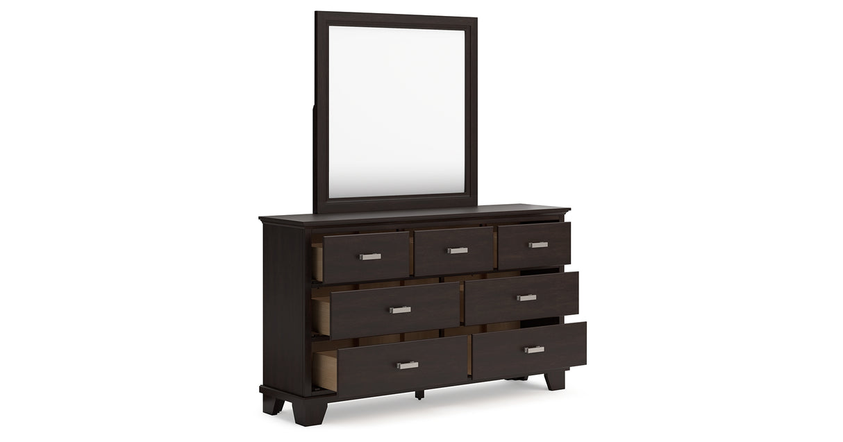 Covetown Queen Panel Bed with Mirrored Dresser and Chest in Dark Brown from Ashley Furniture - Luna Furniture