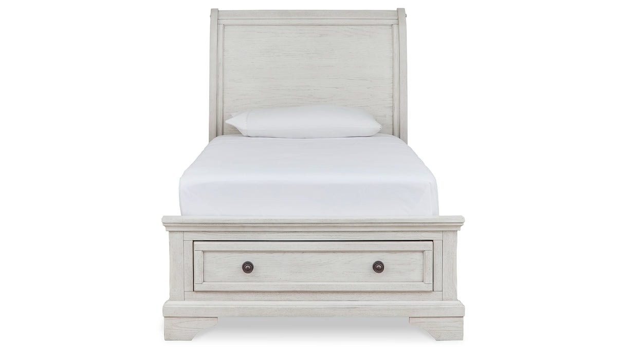 Robbinsdale Antique White Twin Sleigh Storage Bed and Dresser from Ashley - Luna Furniture