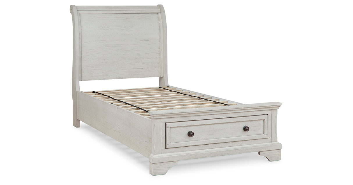 Robbinsdale Antique White Twin Sleigh Storage Bed and Dresser from Ashley - Luna Furniture