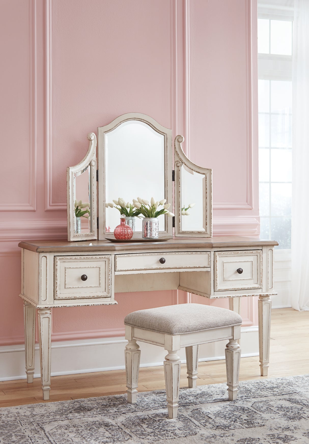Realyn Antiqued Two-Tone Twin Upholstered Panel Bed, Chest, Vanity and Nightstand from Ashley Furniture - Luna Furniture