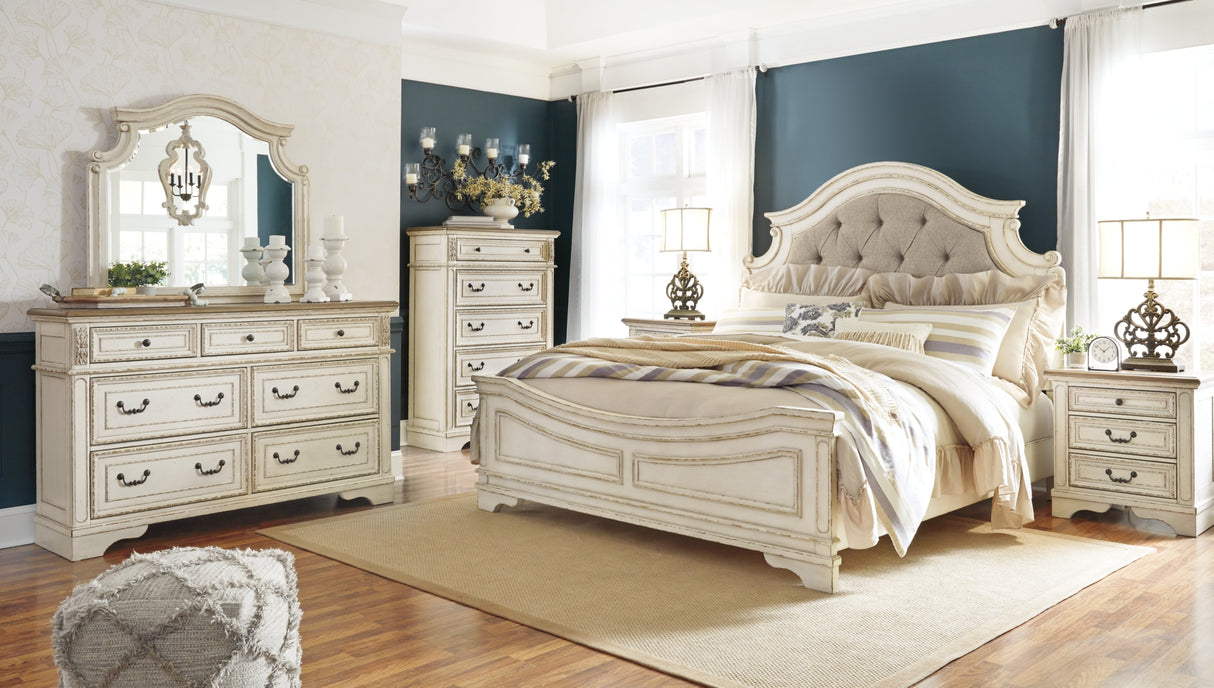 Realyn Chipped White Queen Upholstered Panel Bed with Mirrored Dresser, Chest and Nightstand from Ashley - Luna Furniture