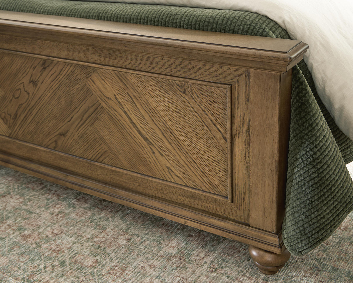 Karallin Medium Brown California King Panel Bed from Ashley - Luna Furniture