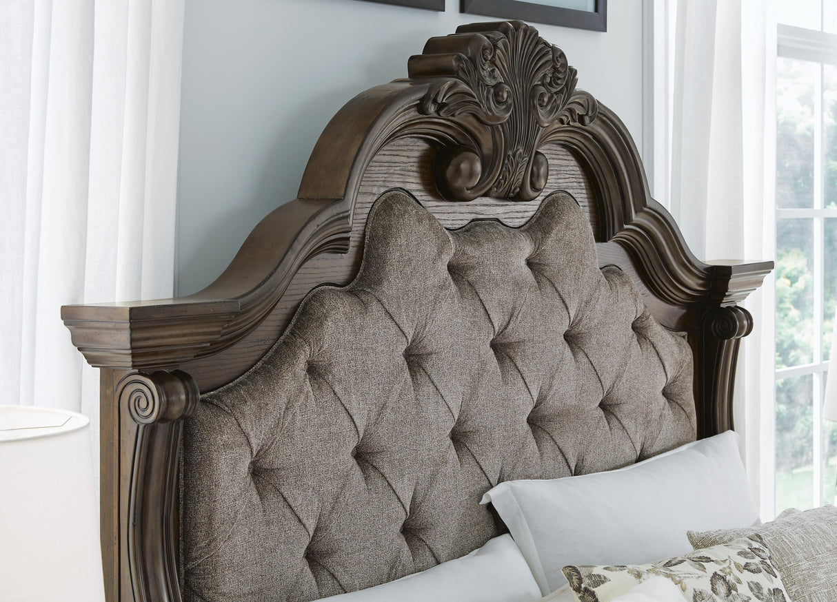 Maylee Dark Brown California King Upholstered Panel Bed from Ashley Furniture - Luna Furniture
