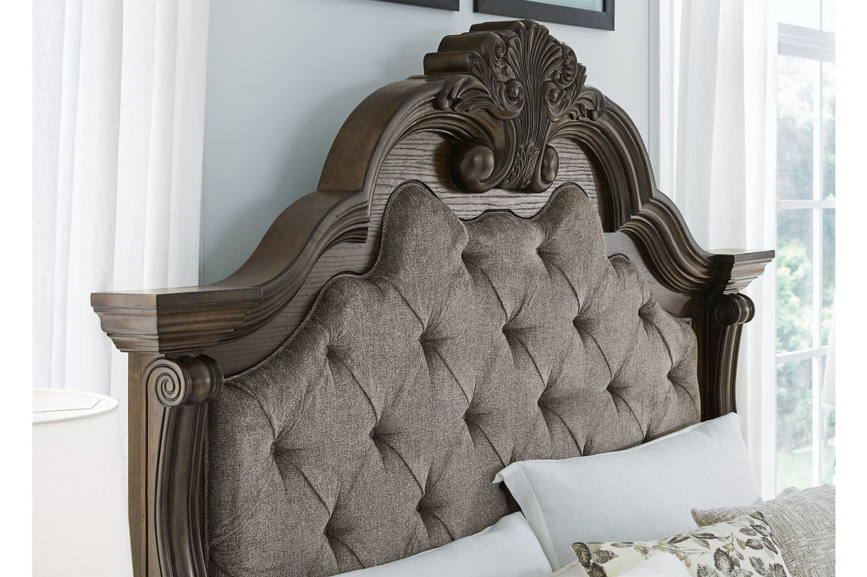 Maylee Dark Brown California King Upholstered Panel Bed from Ashley - Luna Furniture