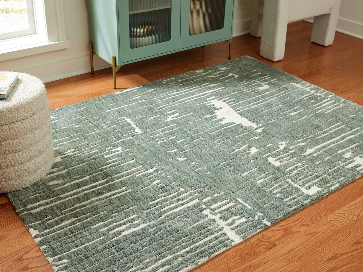 Cayworth Teal/White Medium Rug from Ashley Furniture - Luna Furniture