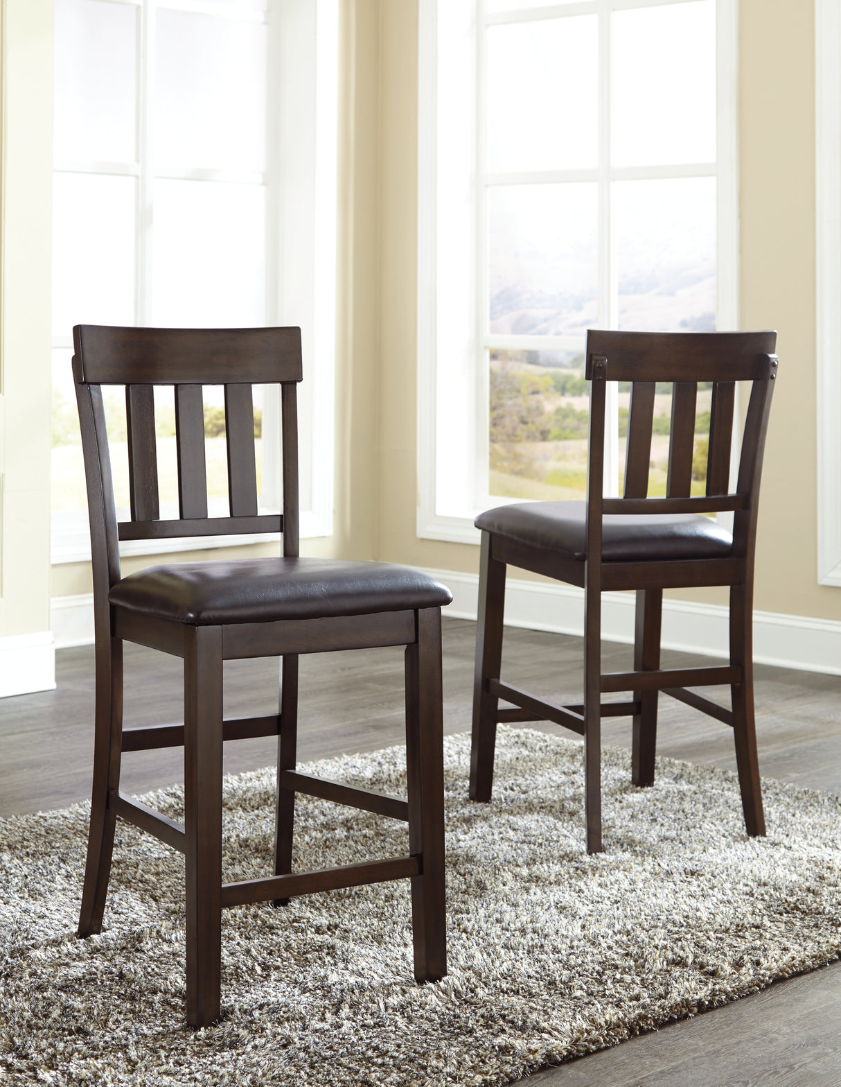 Haddigan Dark Brown Counter Height Dining Table and 4 Barstools from Ashley Furniture - Luna Furniture