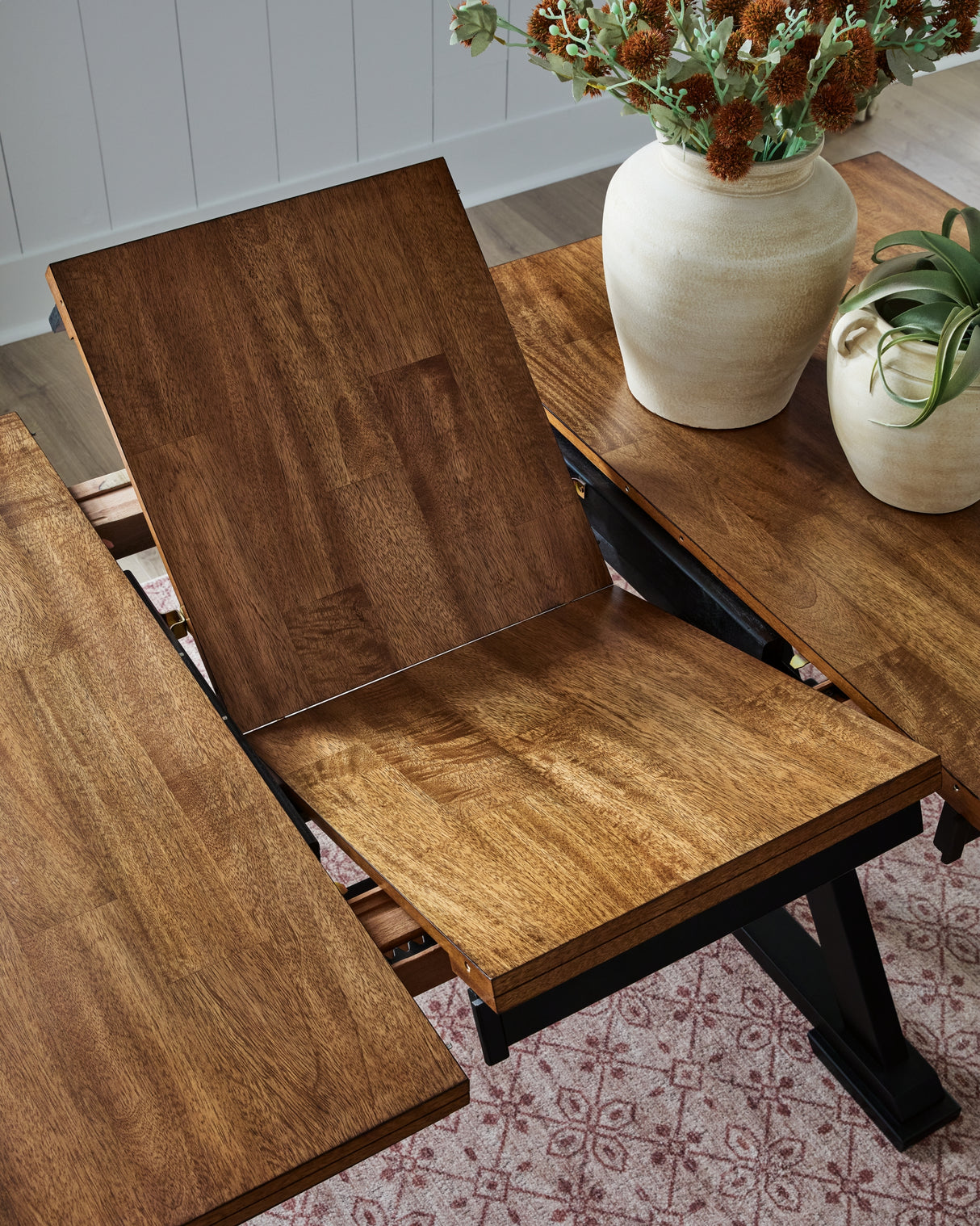 Wildenauer Brown/Black Counter Height Butterfly Extension Table from Ashley Furniture - Luna Furniture