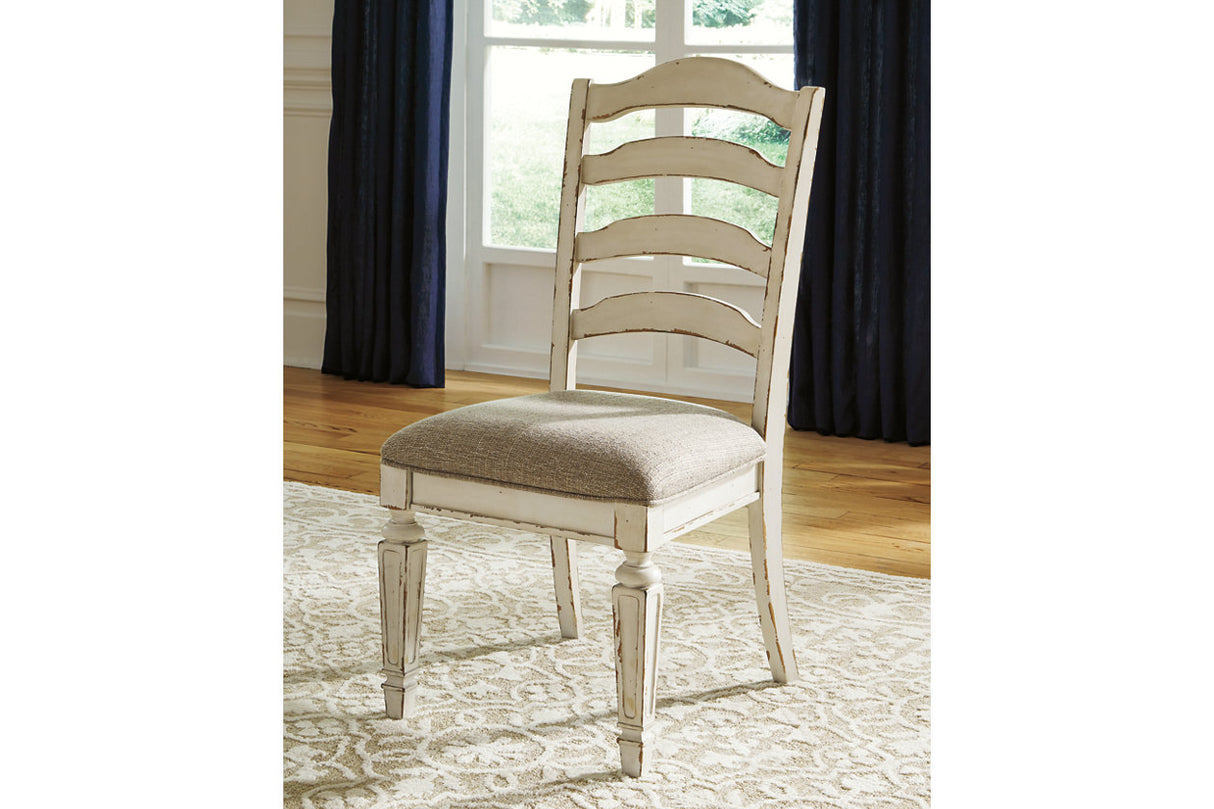 Realyn Chipped White Oval Dining Table and 4 Ladder Back Chairs from Ashley Furniture - Luna Furniture