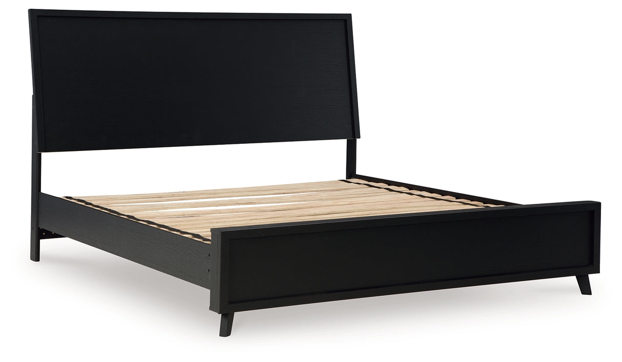 Danziar King Panel Bed with Mirrored Dresser and Chest in Black from Ashley - Luna Furniture