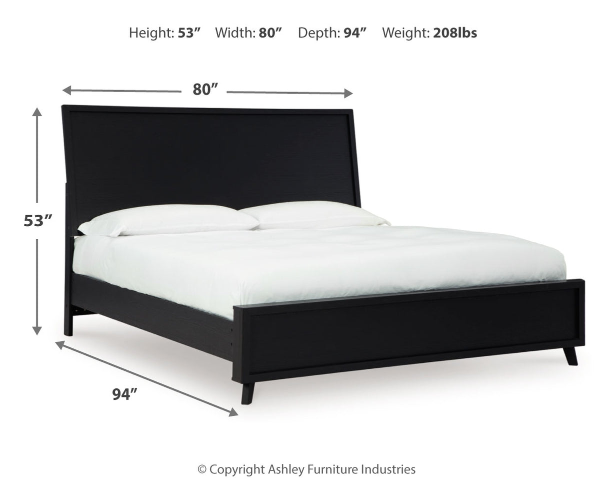 Danziar King Panel Bed with Mirrored Dresser and Chest in Black from Ashley - Luna Furniture