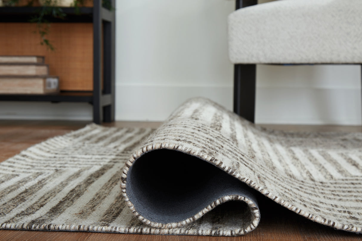 Jossen Ivory/Gray Medium Rug from Ashley Furniture - Luna Furniture