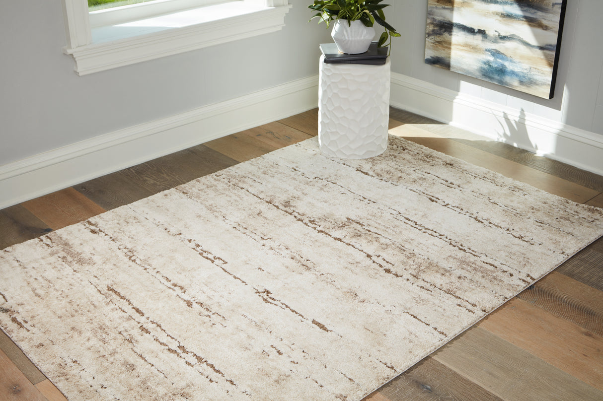 Kasney Cream/Brown Large Rug from Ashley - Luna Furniture