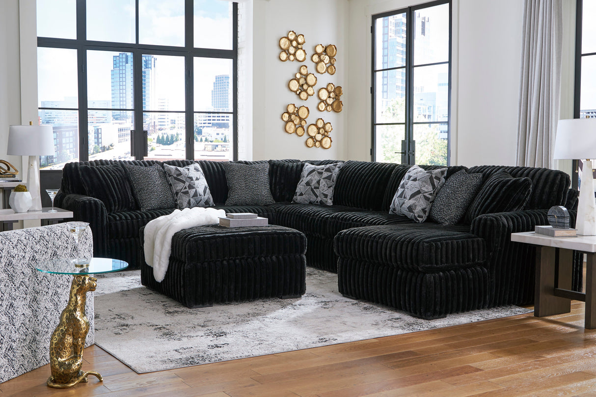 Midnight-Madness 4-Piece Sectional with Ottoman in Onyx from Ashley - Luna Furniture