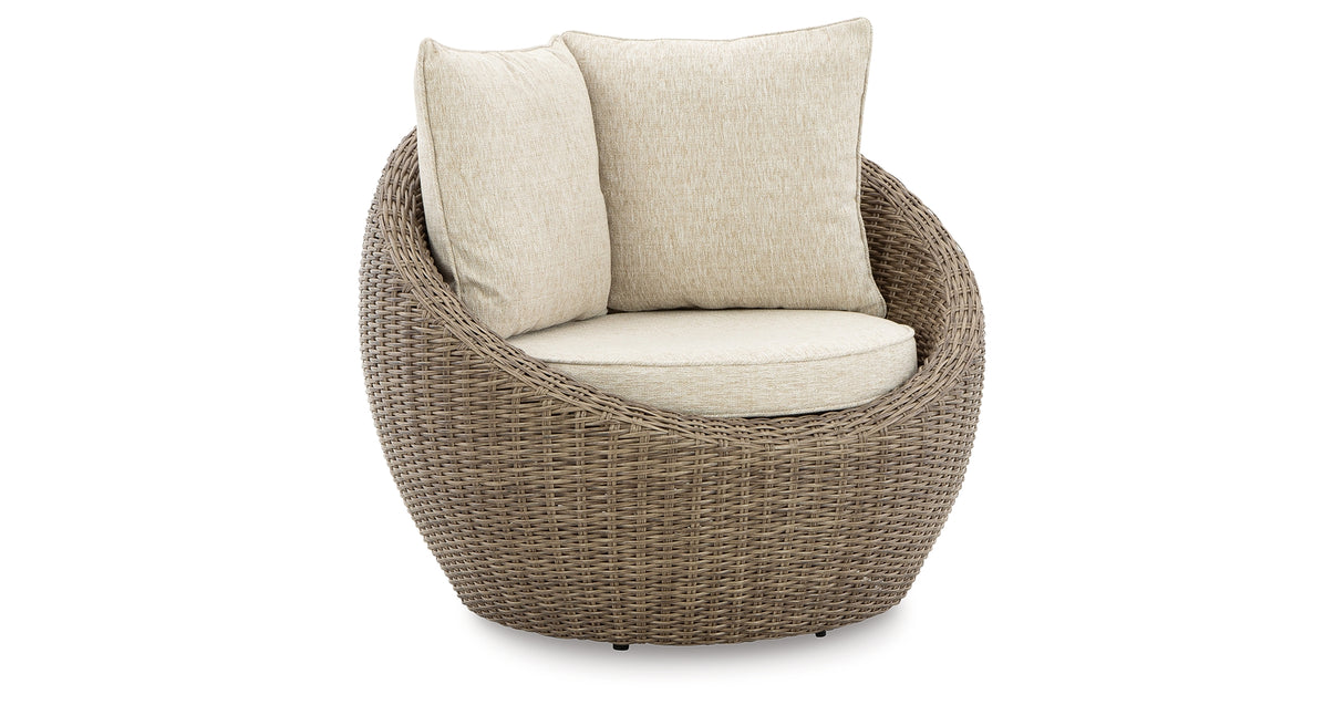 DANSON Beige Swivel Lounge with Cushion from Ashley Furniture - Luna Furniture