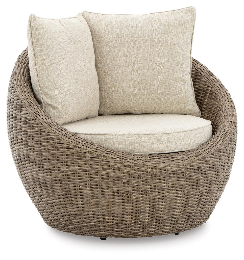 DANSON Beige Swivel Lounge with Cushion from Ashley Furniture - Luna Furniture