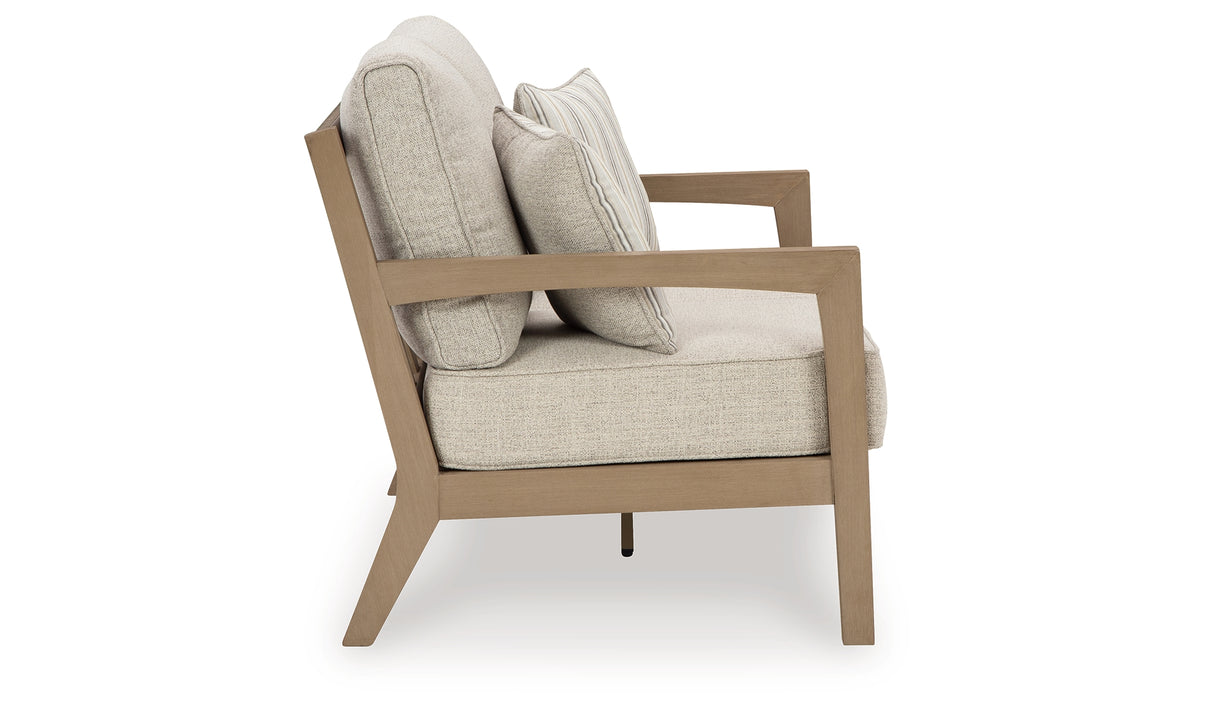 Hallow Creek Driftwood Outdoor Loveseat with Cushion from Ashley Furniture - Luna Furniture
