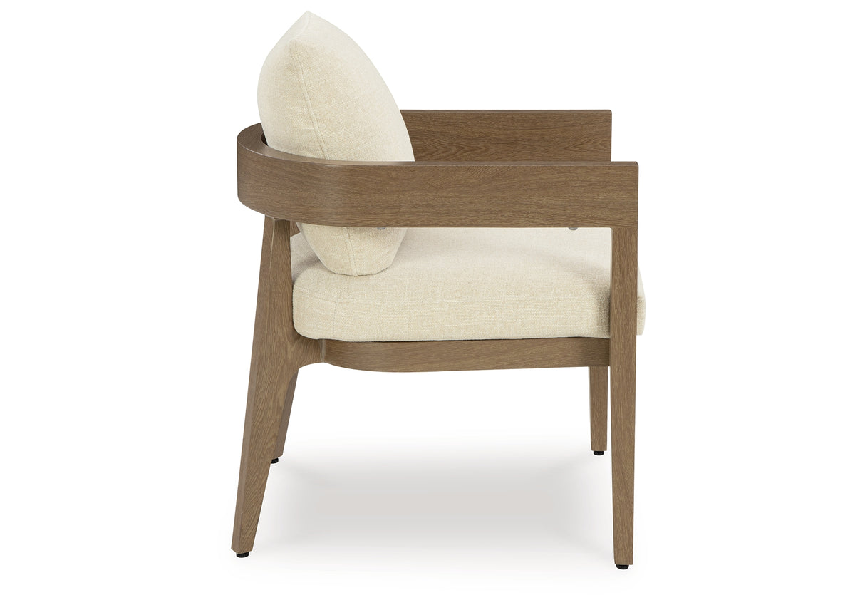 Serene Bay Dark Brown/White Outdoor Dining Arm Chair with Cushion from Ashley Furniture - Luna Furniture