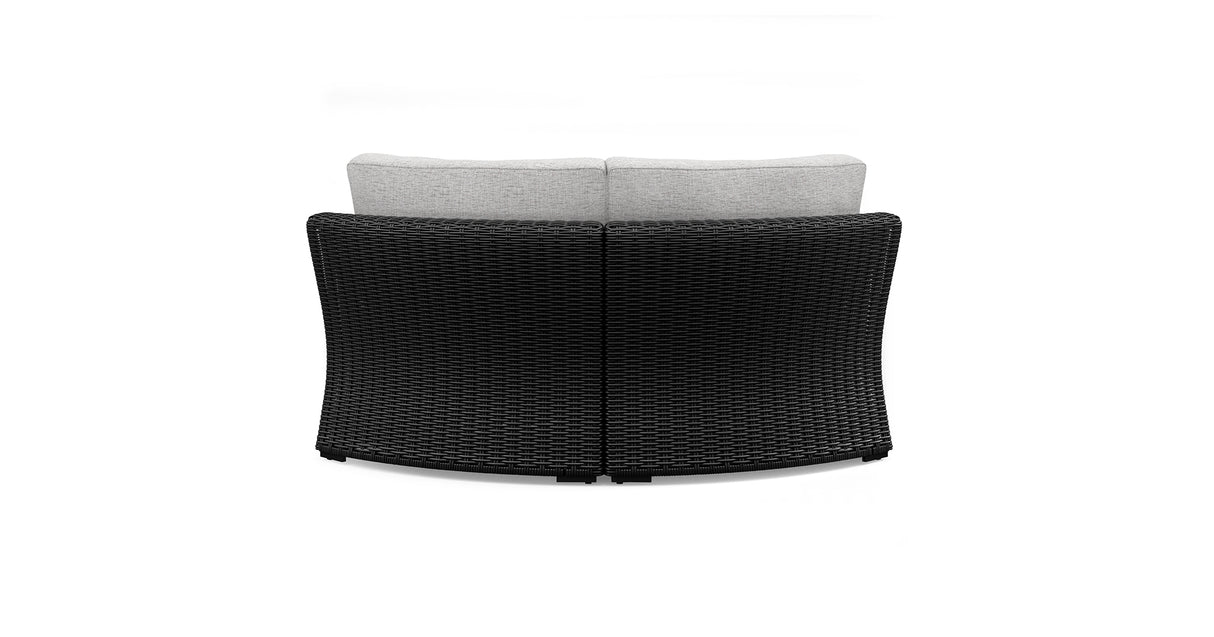 Beachcroft Black/Light Gray Outdoor Curved Corner Chair with Cushion from Ashley Furniture - Luna Furniture