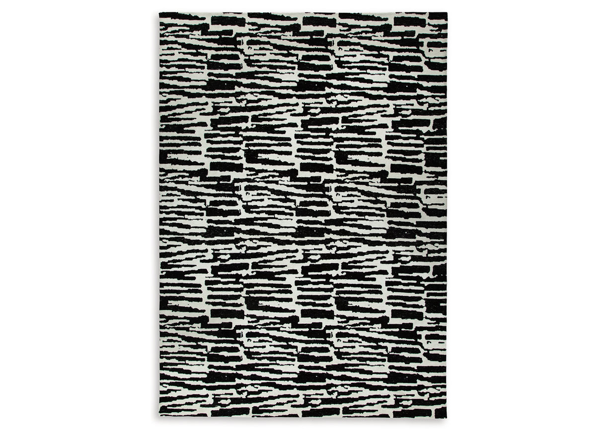 Bramshaw Black/Ivory Extra Large Rug from Ashley Furniture - Luna Furniture