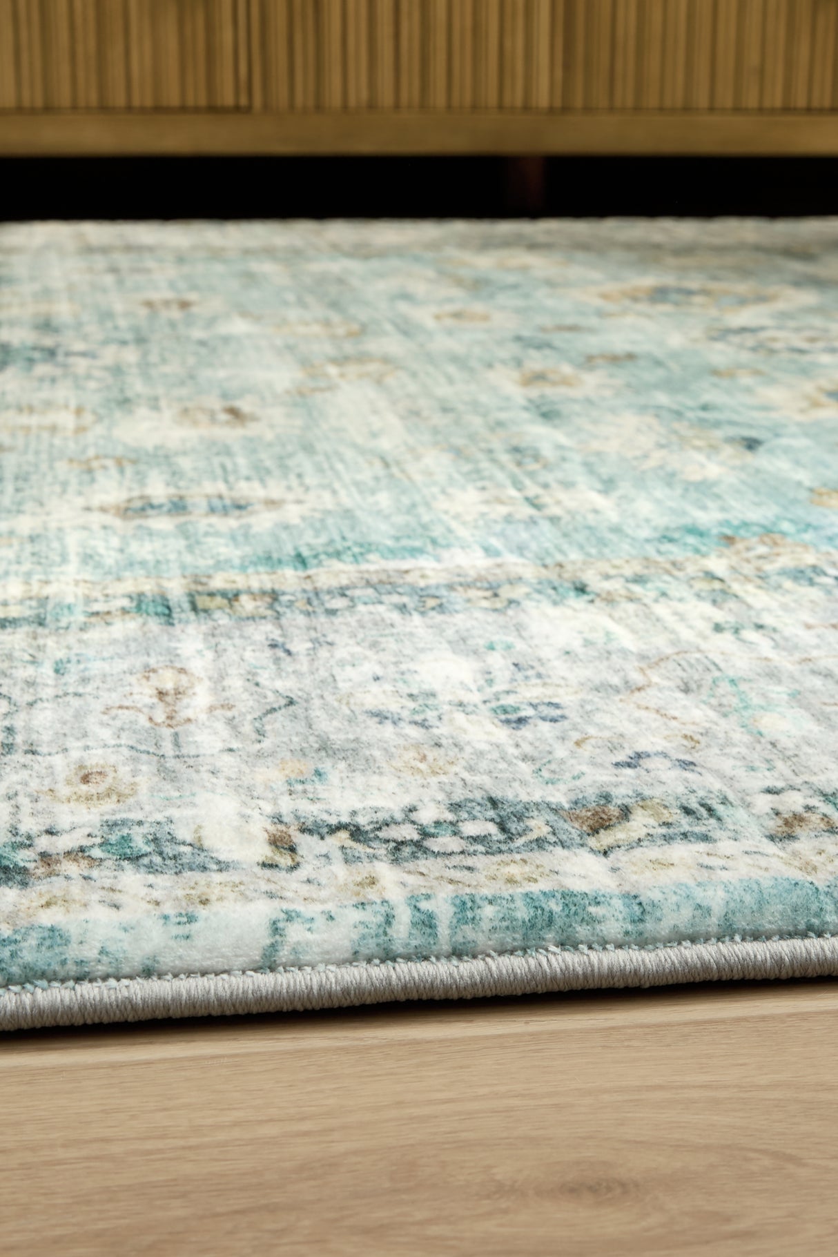 Ladstoney Teal/Beige/Ochre Medium Rug from Ashley Furniture - Luna Furniture